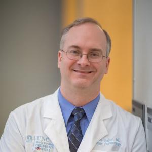 A photo of Charles Esther, MD, PhD.