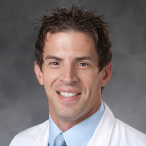 A photo of Micah T. McClain, MD, PhD.
