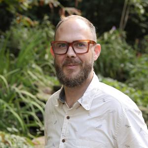 A photo of Corey McMillan, PhD.